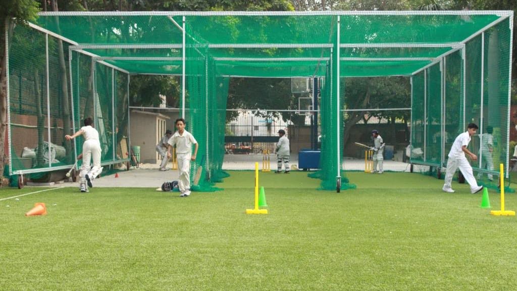 Senior School students practicing cricket in the nets